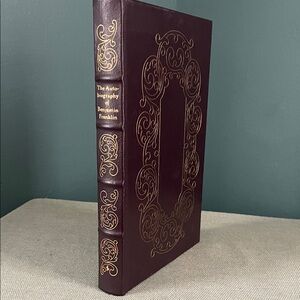 Elegant Leather Bound Book with Gold Detailing